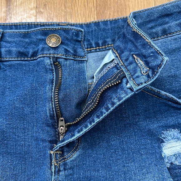 Women’s blue denim distressed jean shorts - Picture 9 of 16